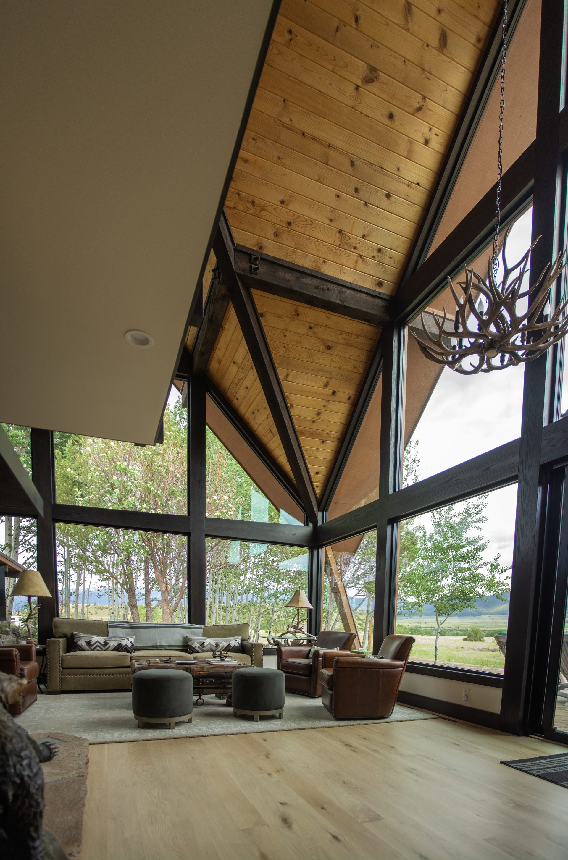 Barry Ranch Road interior — cathedral ceilings with steel beams